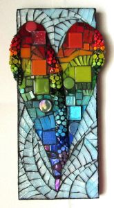 Glass mosaic on wood base. 11"x4.5"